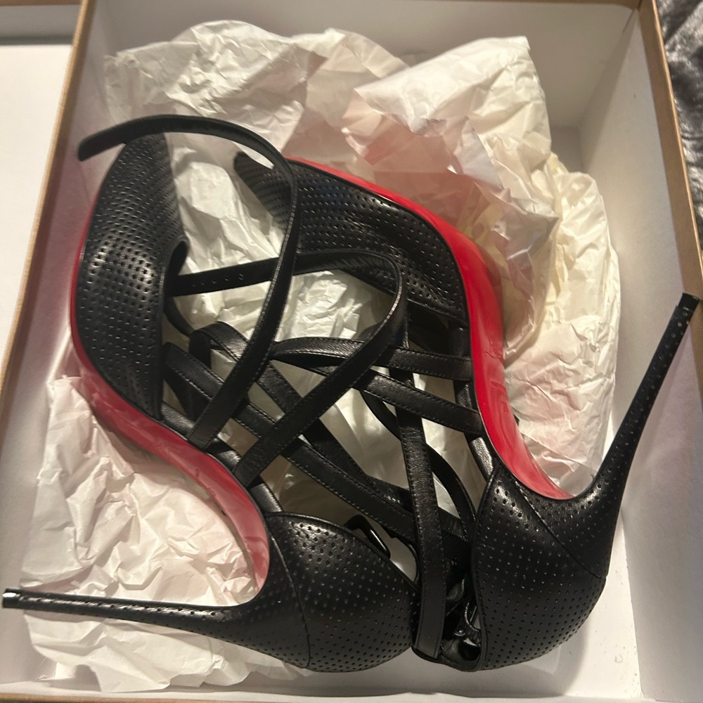 Christian Louboutin. Worn once for 3 hours, in box but no dust bag